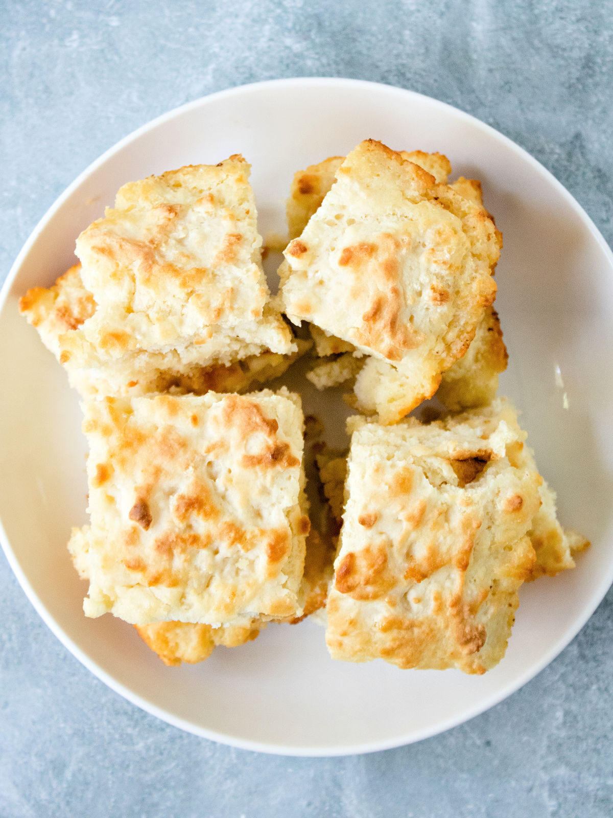 Butter Swim Biscuits on a white plate.