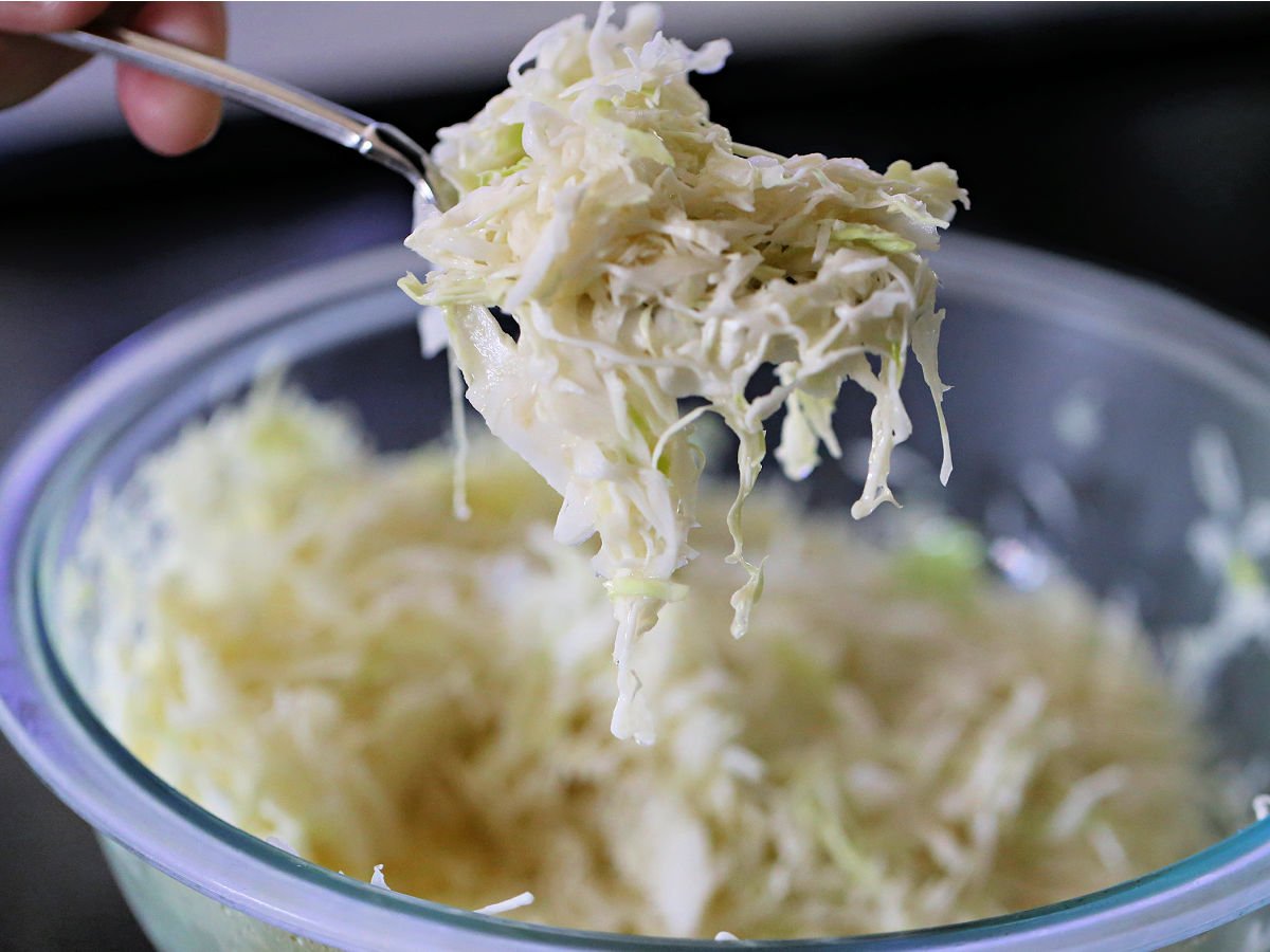Scoop of vinegar coleslaw.