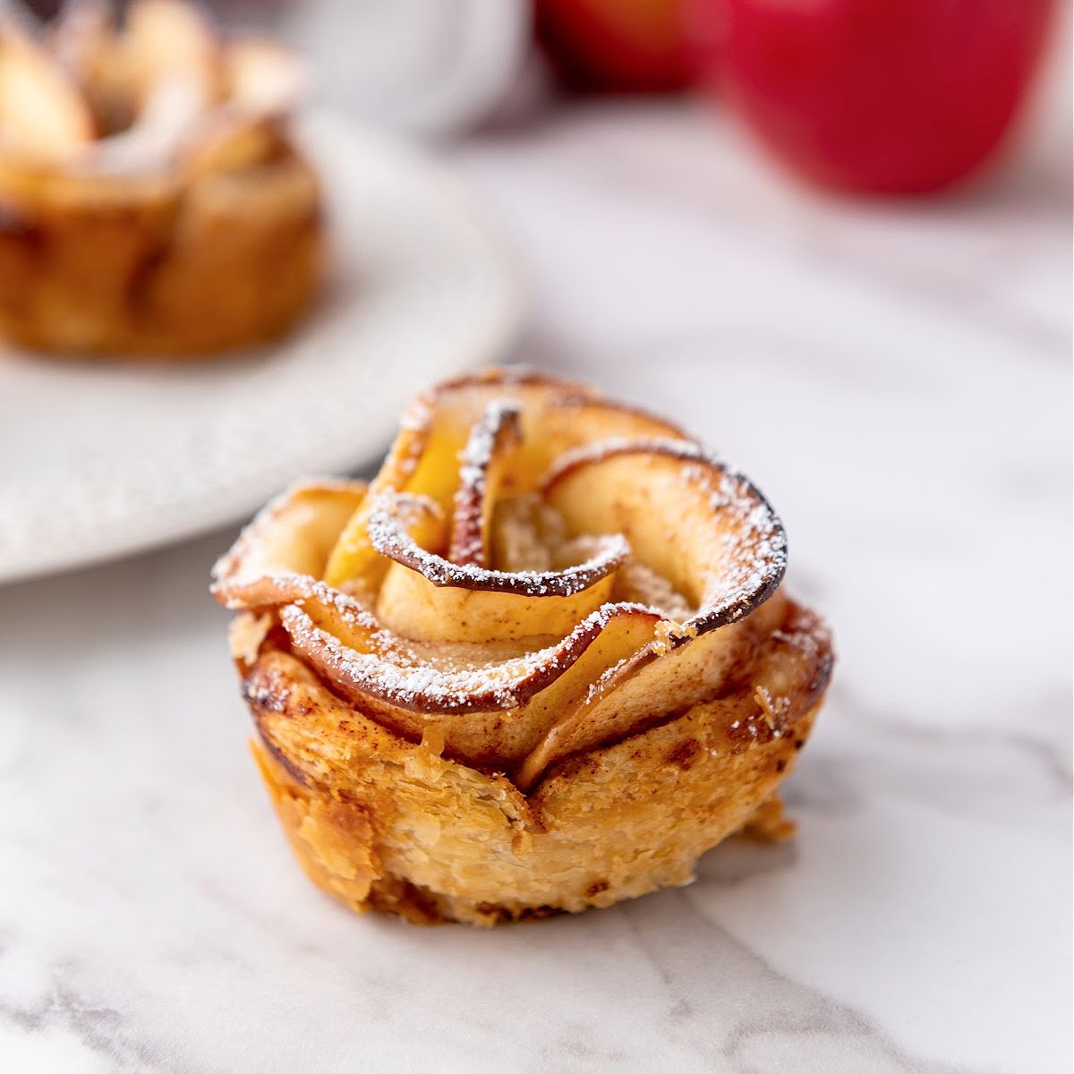 Apple rose made with apple slices and puff pastry.