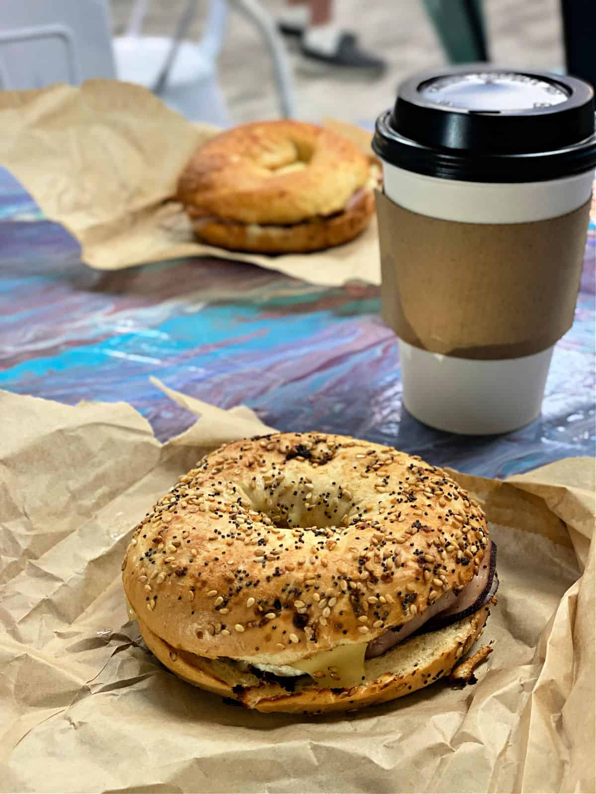 Everything bagel with meat and cheese.