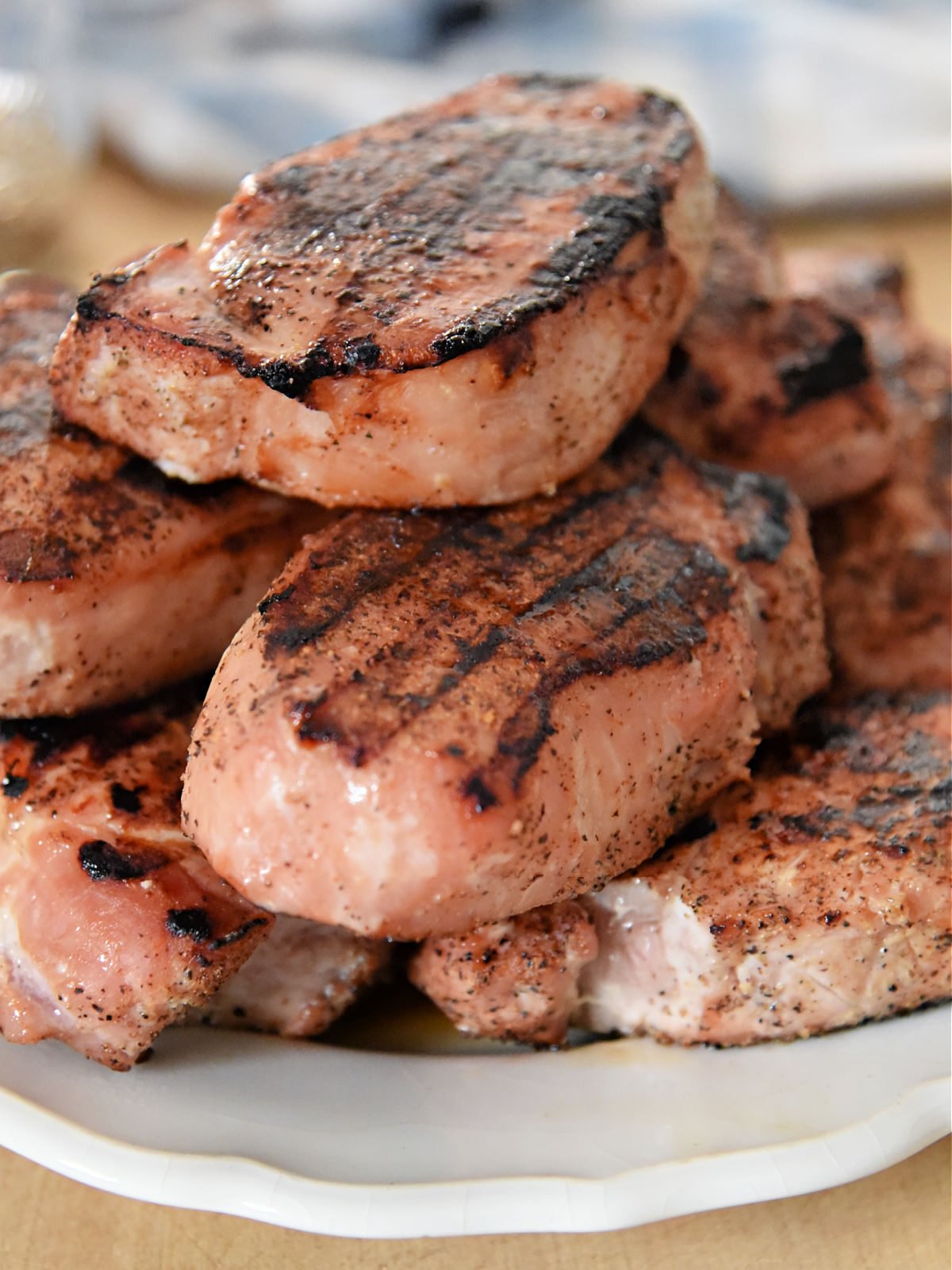 Platter topped with grilled pork chops.