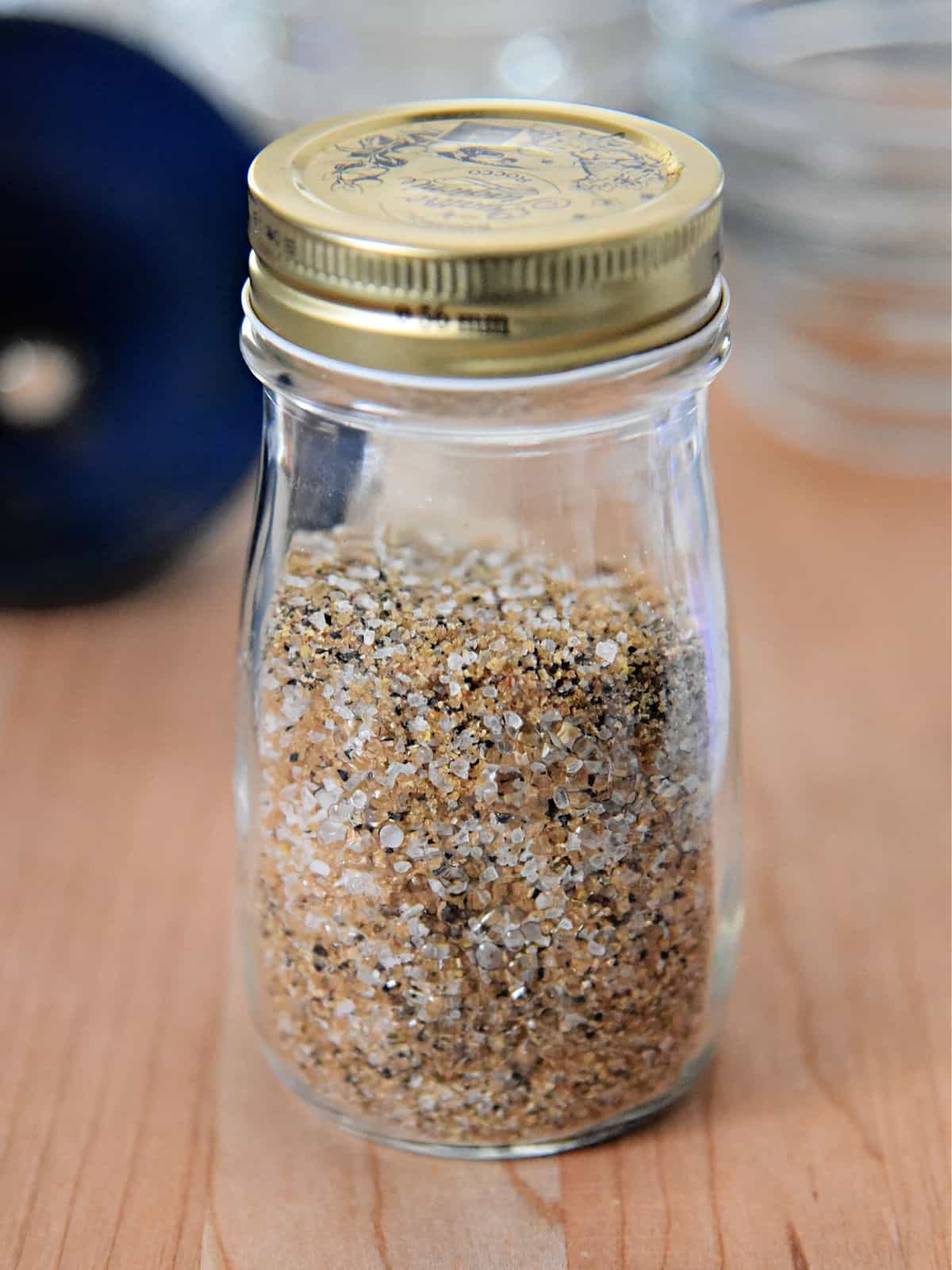 Spices combined together in a small glass jar.