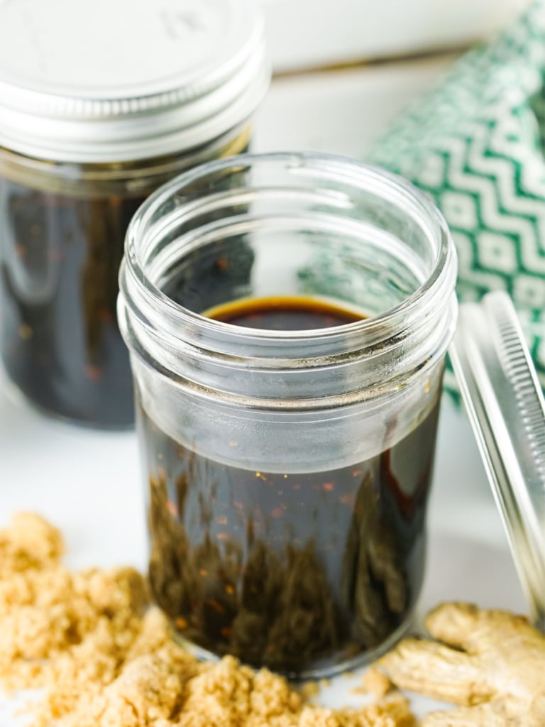 Homemade teriyaki sauce in a small glass Mason jar.