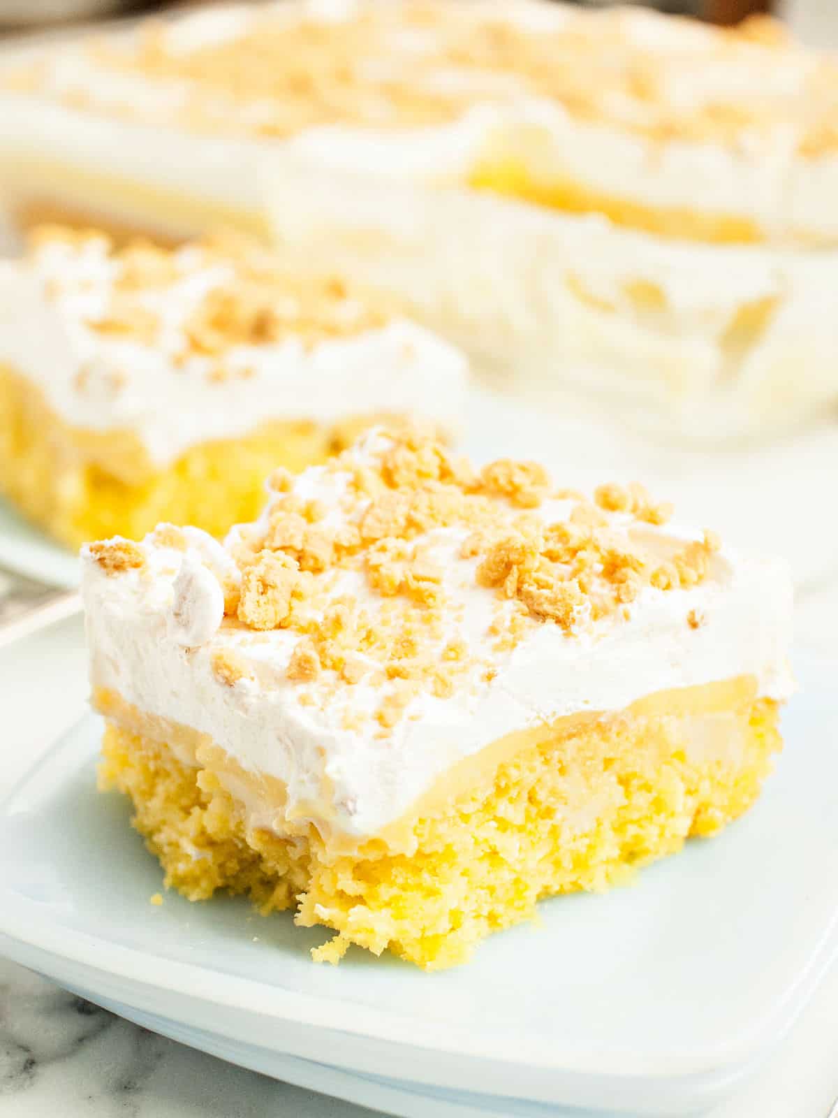 Creamy lemon poke cake southern kissed
