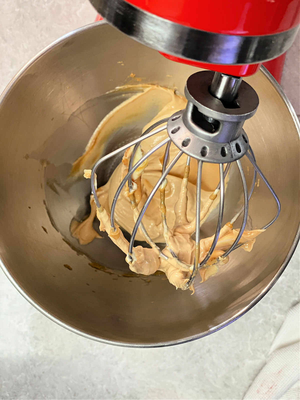 Creamed butter and peanut butter in an electric mixer bowl.