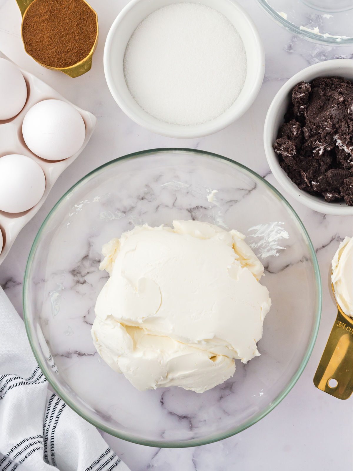 Cream cheese in a glass bowl.