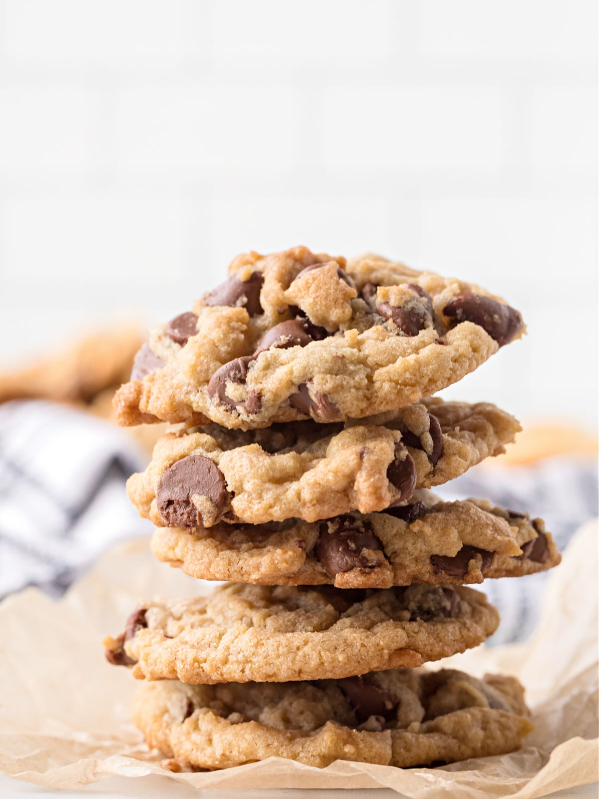 Stack of eggless chocolate chip cookies.