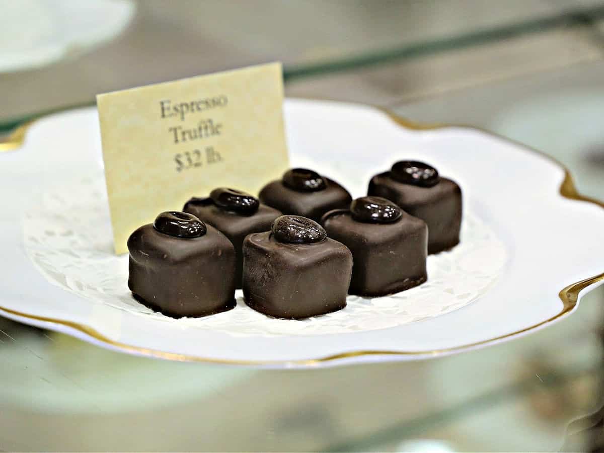 Plate with six espresso truffles.