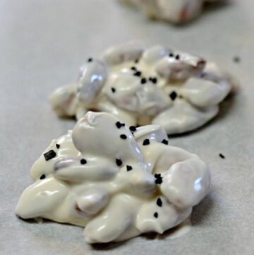 Almonds coated in white chocolate and topped with black sea salt.