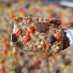 Slice of magic cookie bar on a metal spatula.