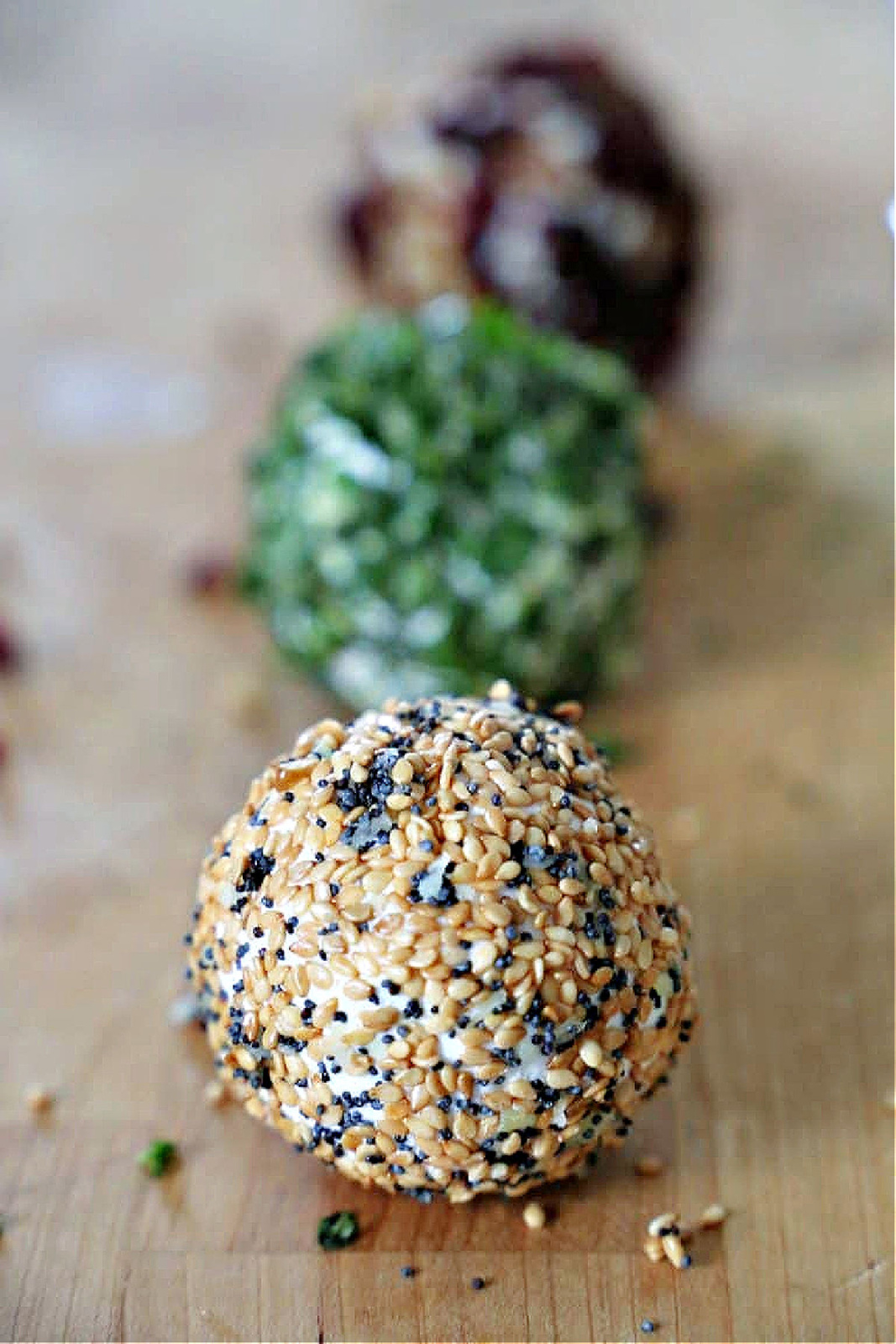 Cream cheese ball with sesame seeds.
