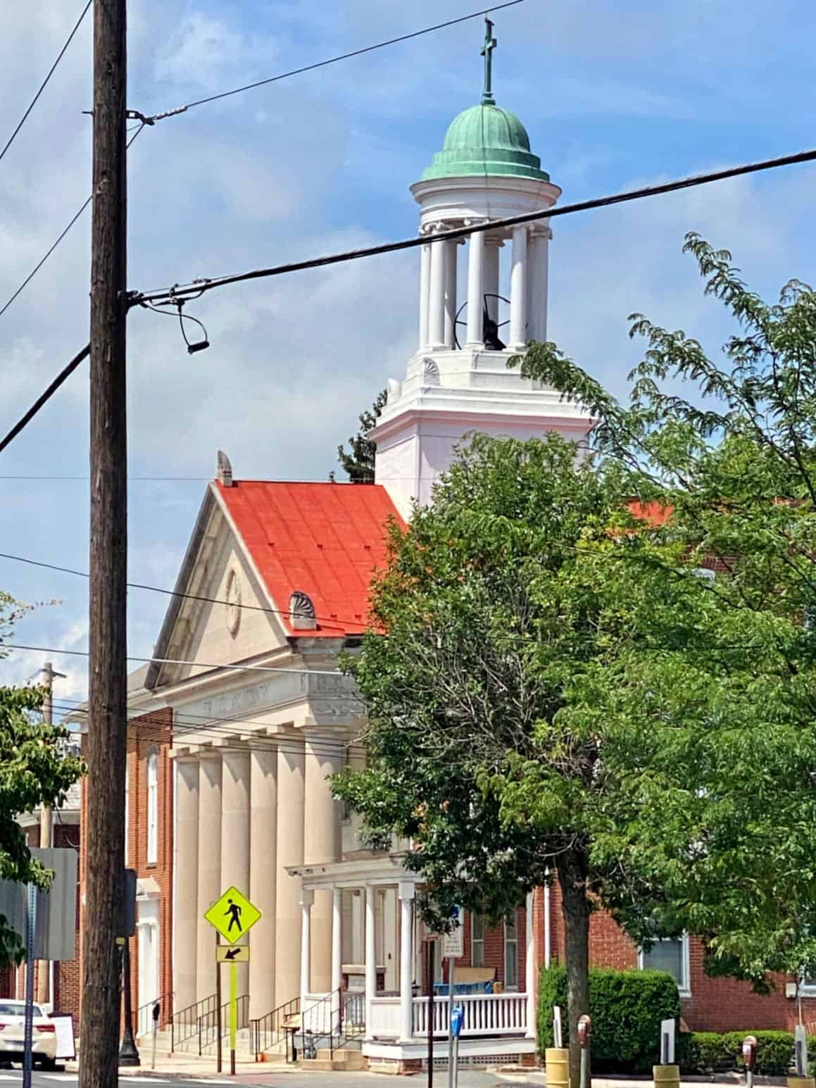 Old building with columns and cupola on top.