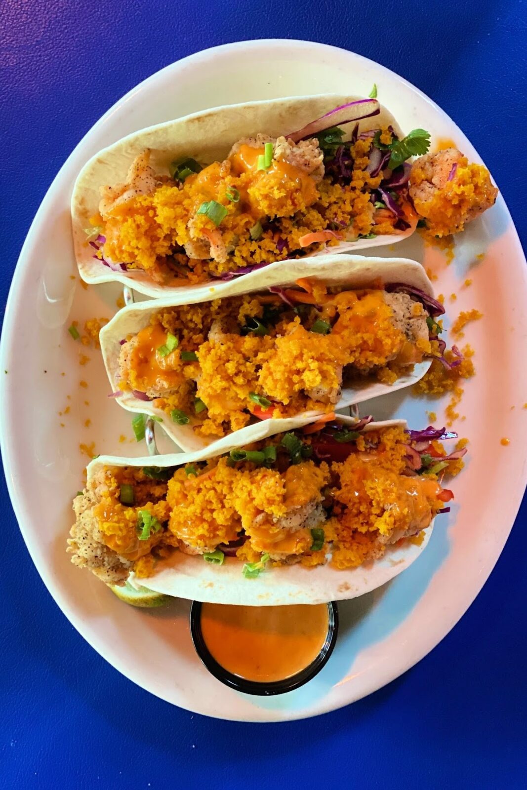 Plate of spicy shrimp tacos.