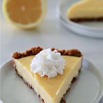 Lemon pie with Grape Nuts crust on a plate.