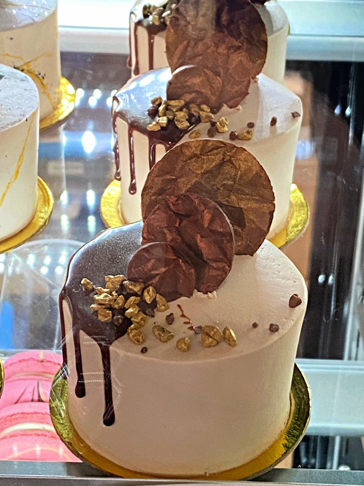 Mini chocolate cakes on display.