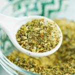 Scoop of homemade Greek seasoning.