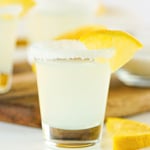 A lemon drop shot in a sugar-rimmed glass.