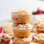Stack of three strawbery muffins.