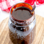 Jar of chocolate syrup.