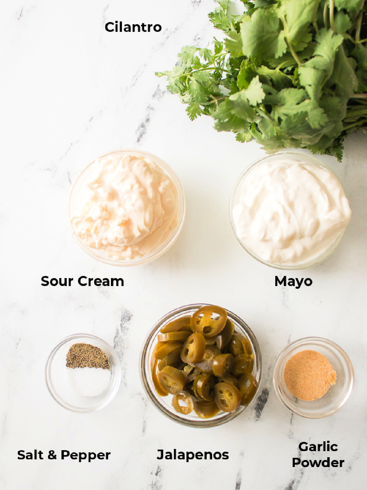 Measured fresh ingredients laid out to make jalapeño ranch dressing.