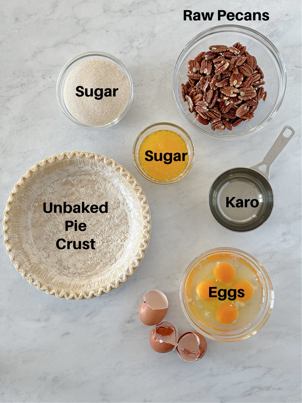 Ingredients to make a pecan pie.