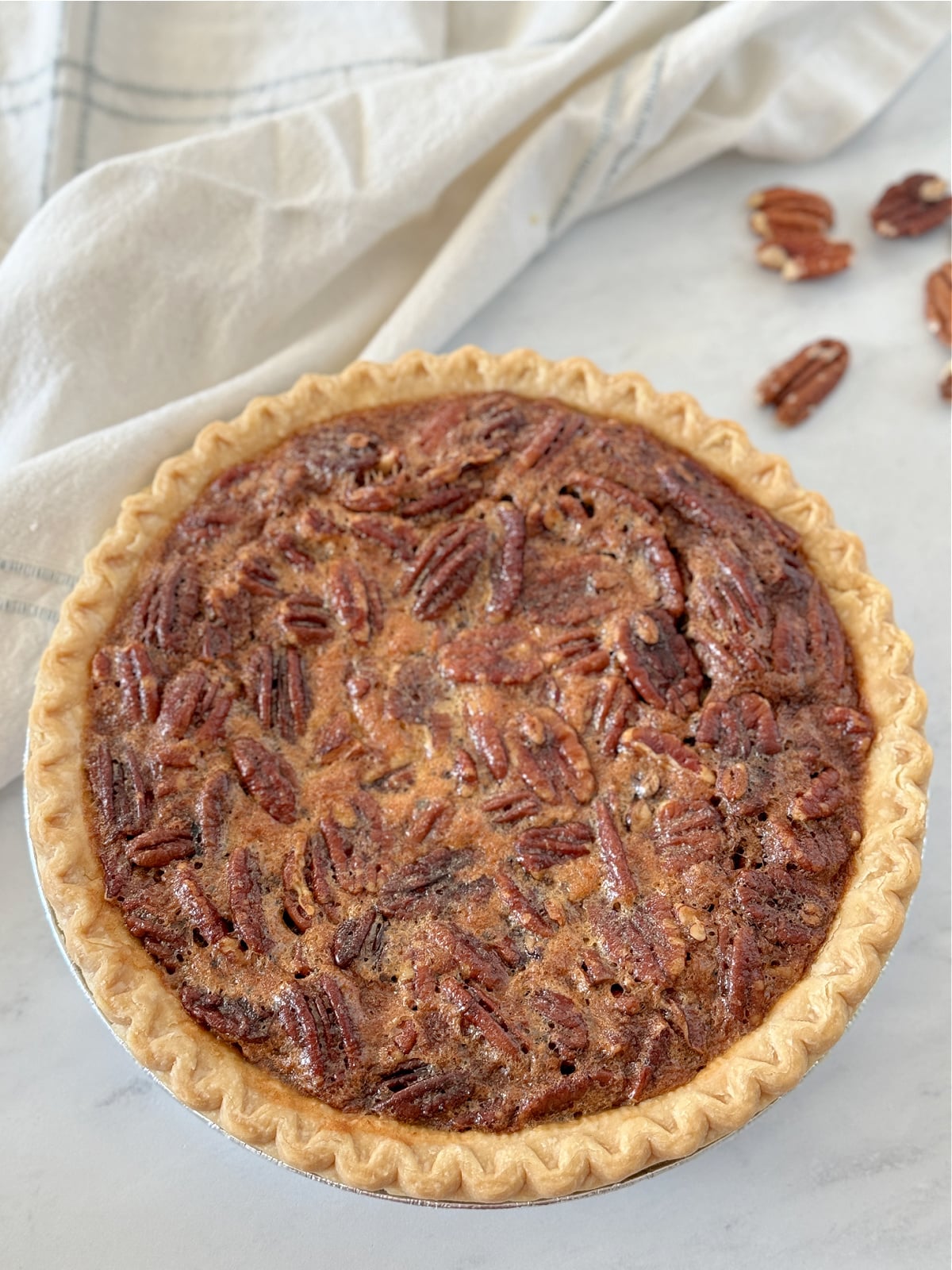 Pecan pie on a counter.