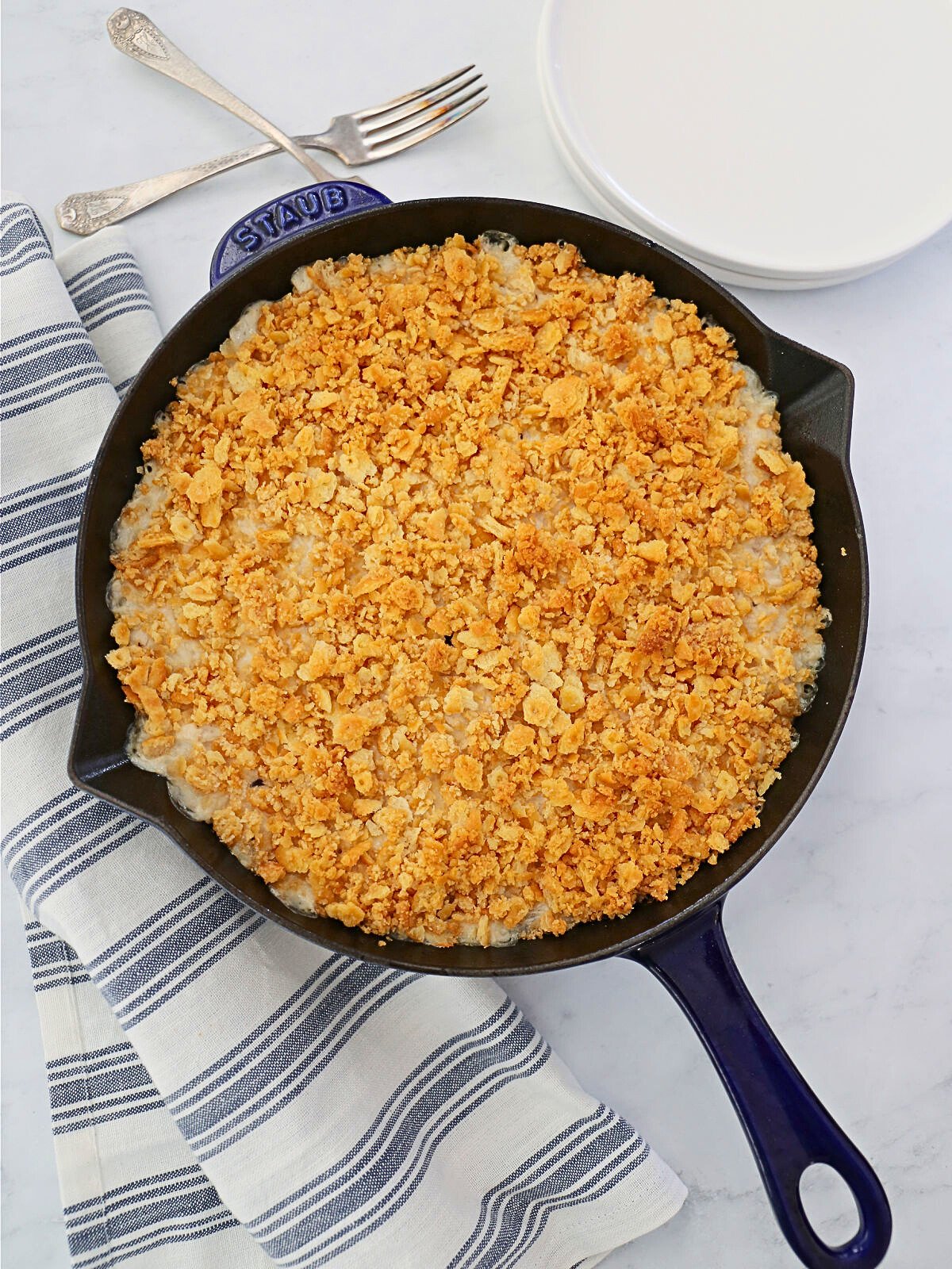 Chicken and rice casserole with Ritz in a cast iron skillet.