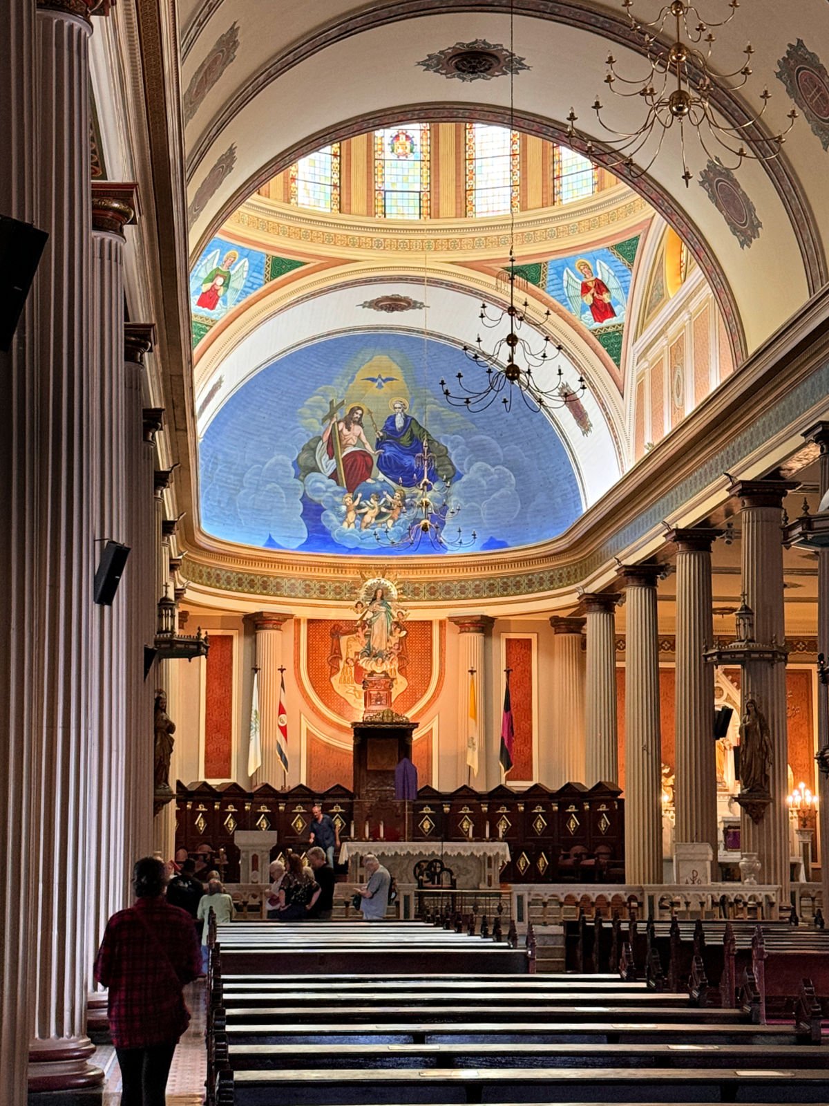 Ornate ceiling inside of a catholic church.