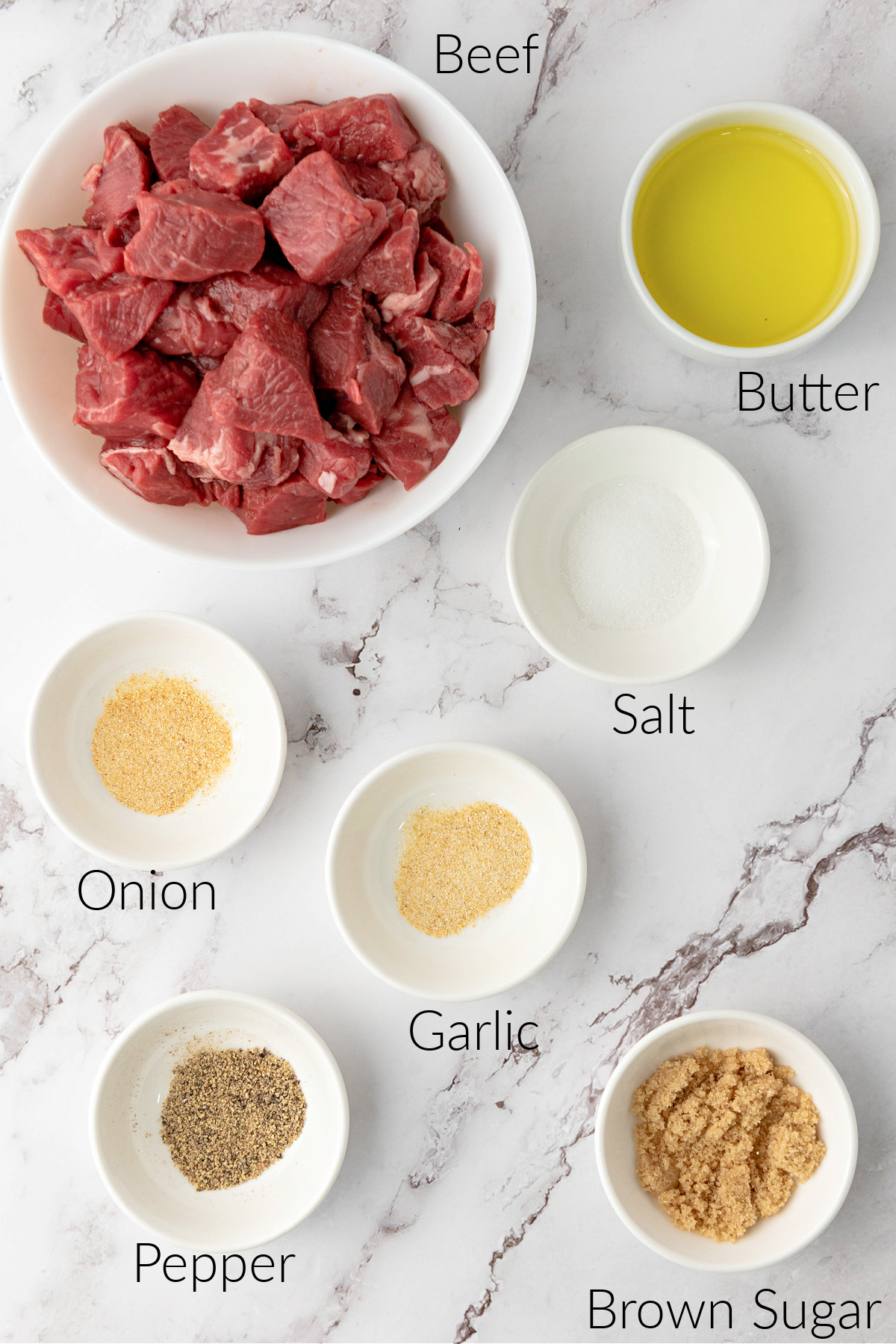 Ingredients arranged to make steak bites in an air fryer.