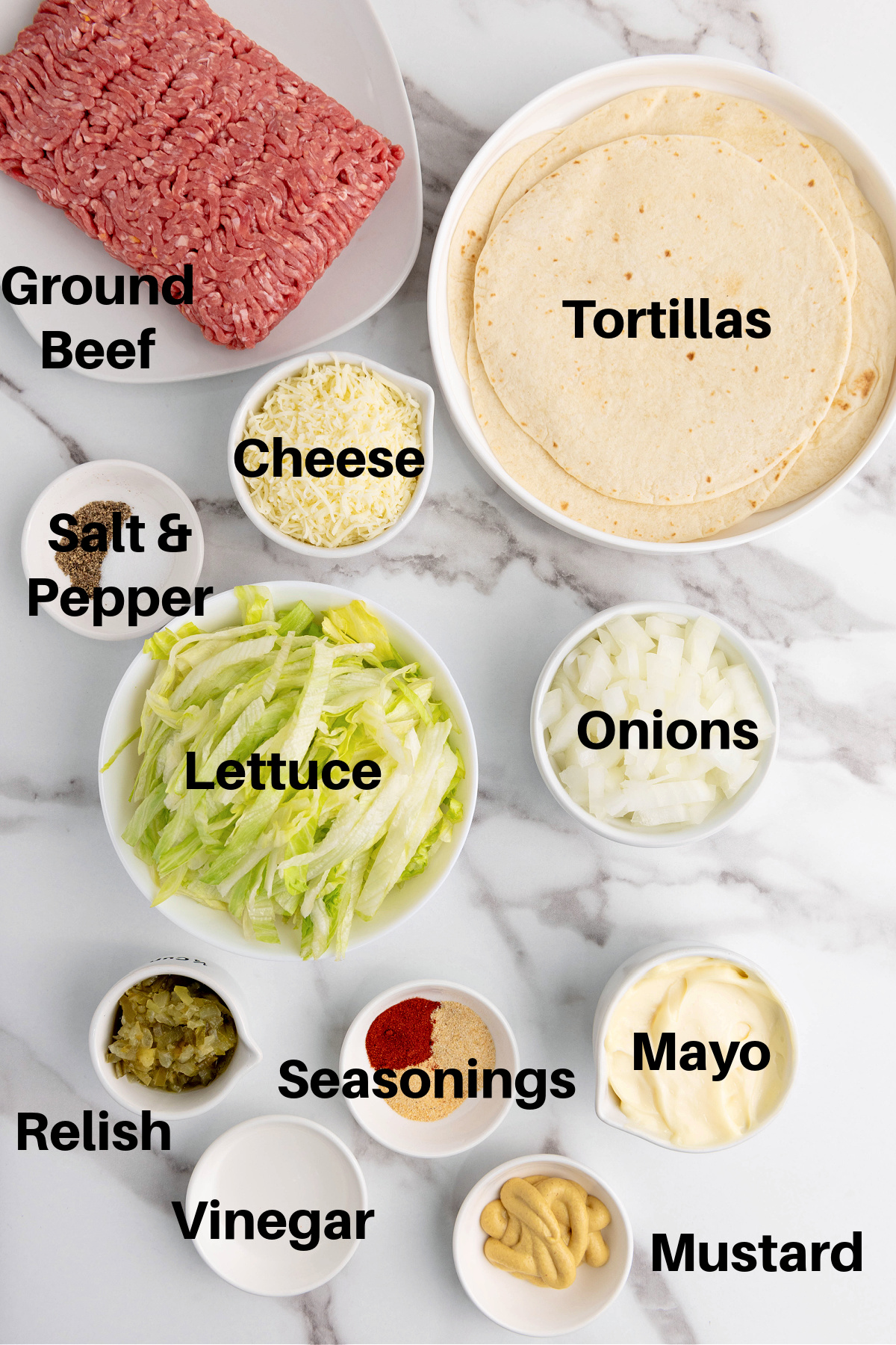 Ground beef, tortillas, cheese, seasoning, onions, lettuce, mayonnaise, mustard, and relish.
