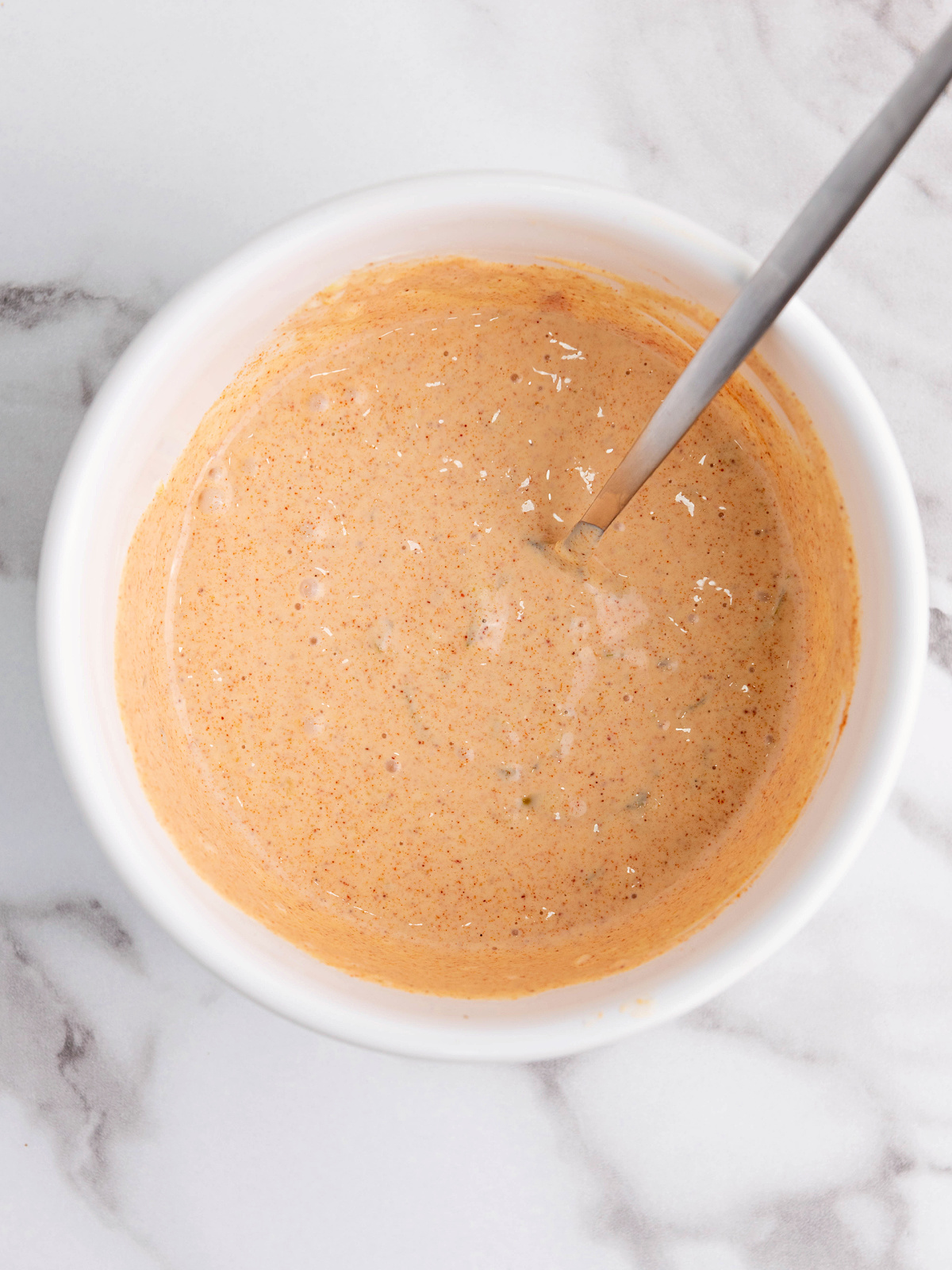 Special sauce made in a small bowl.