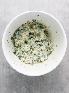 Spinach dip in a bowl.