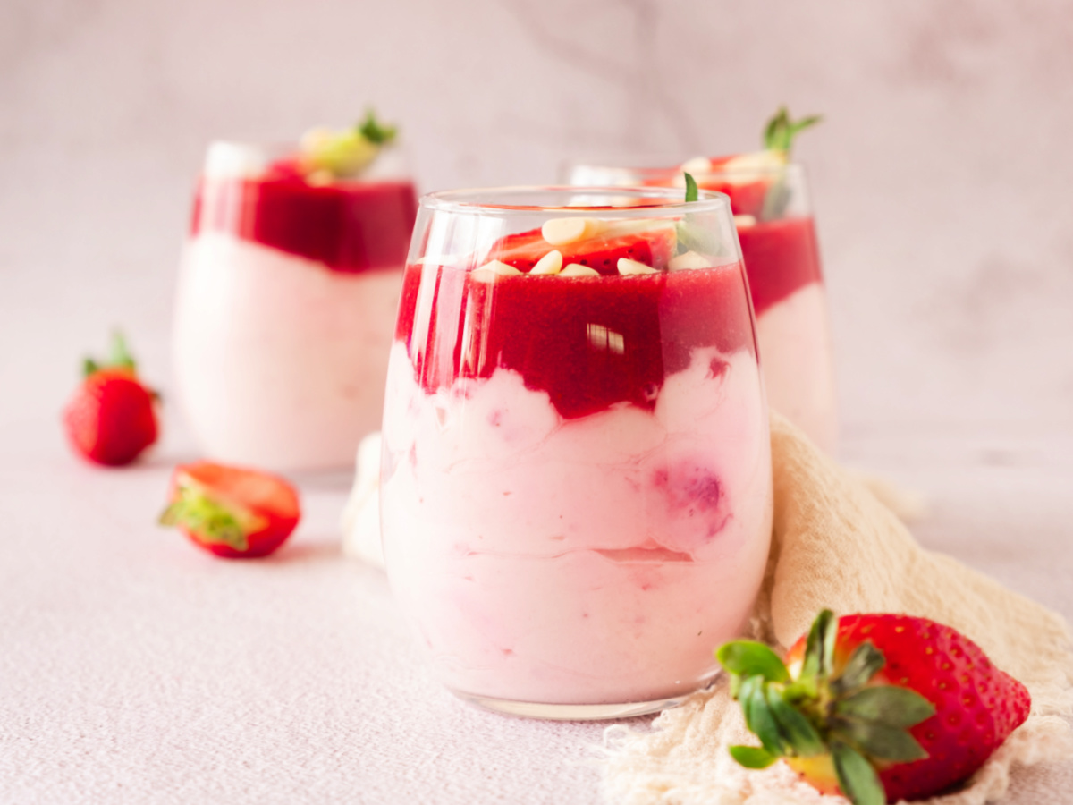 Three glasses of strawberry mousse.