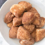Bowl of cinnamon sugar biscuit nibblers.