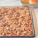 Sweet potato casserole topped with a brown sugar pecan mixture.