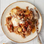 Apple crisp with ice cream.