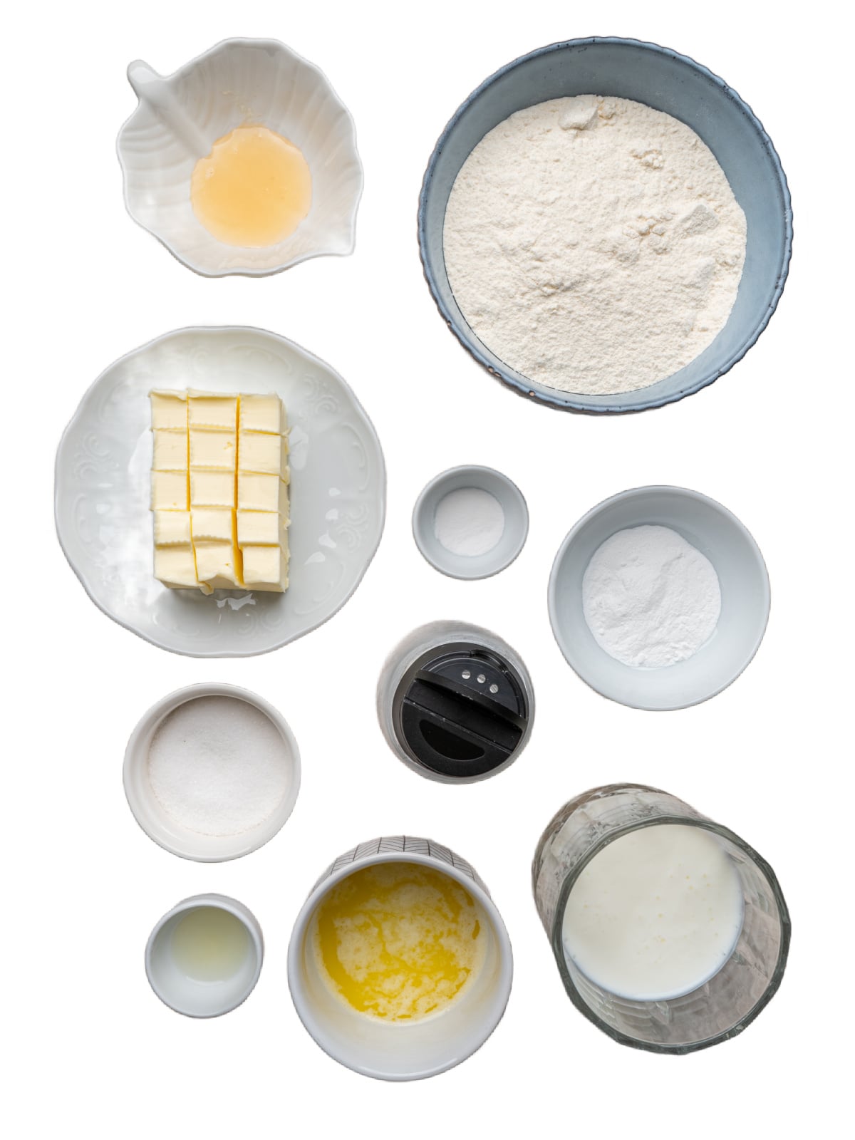 Measured ingredients—flour, buttermilk, butter, and more—arranged for making drop biscuits.