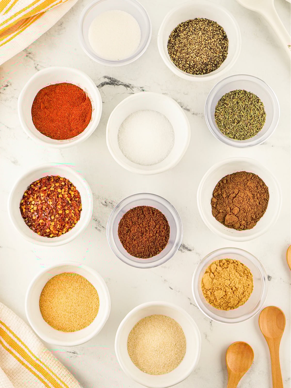 Measured ingredients—spices and herbs—ready to make Jamaican jerk seasoning.