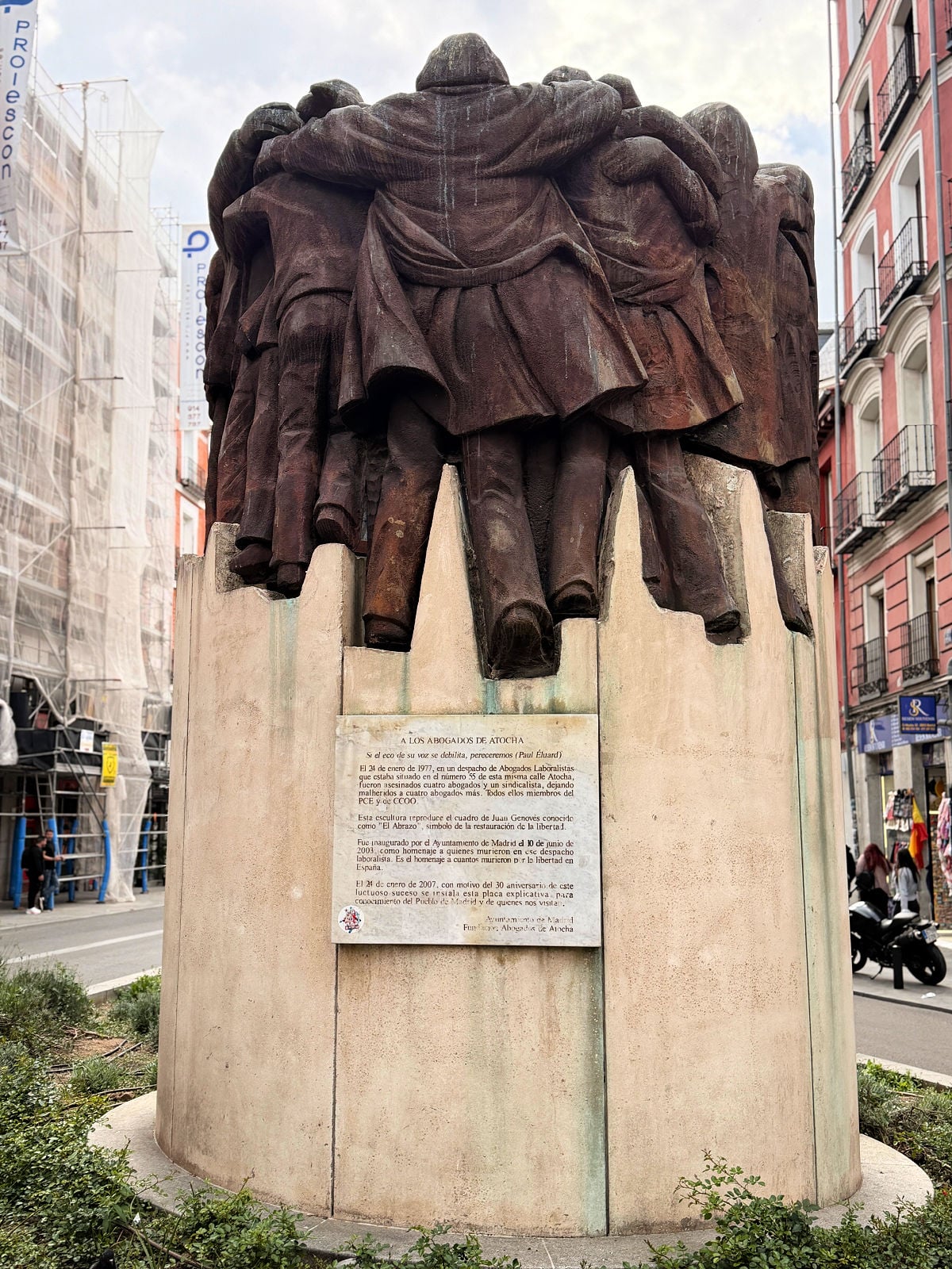 Monument honoring the Lawyers of Atocha in Madrid, symbolizing unity and democracy.